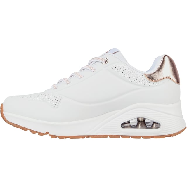 Slip-on a classic style in comfort wearing Skechers Street Uno - Shimmer Away. This fashion sneaker features a synthetic durabuck upper with a metallic trim, stretch laces, Skechers Air-Cooled Memory Foam insole and Skech-Air visible airbag midsole.