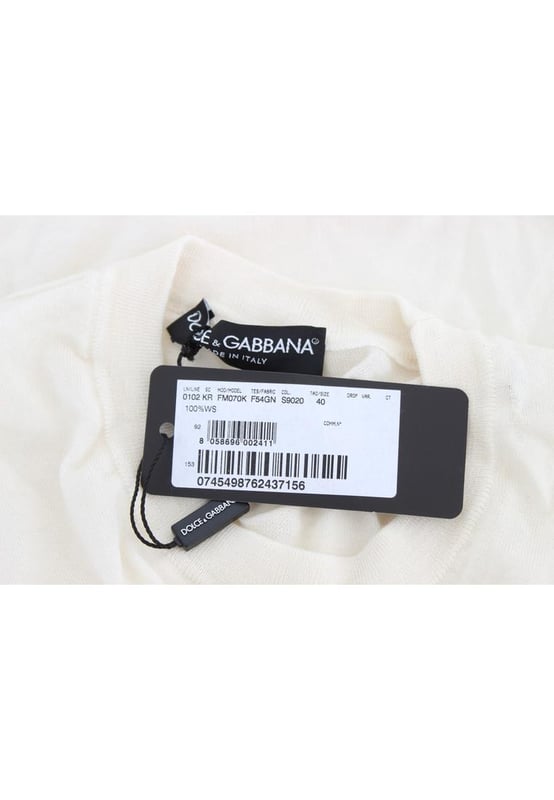 Brand: Dolce \\u0026 Gabbana.\\n  Condition: Brand new with tags.\\n  Material: 100% cashmere.\\n  Color: White.\\n  Sleeve: 1/2 sleeve.\\n  Made in Italy.\\n  Logo details.