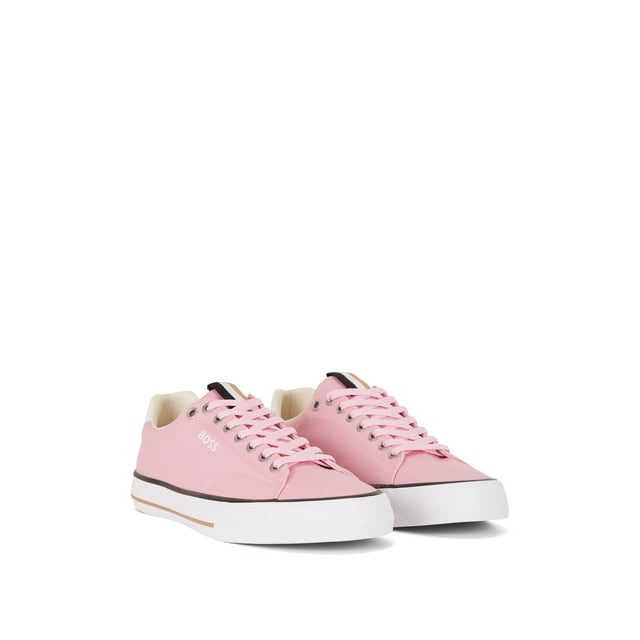 Men's BOSS Aiden Tennis Trainers. Sleek, low profile, BOSS' Aiden tennis trainers are crafted from crisp canvas with vulcanised rubber soles to support outdoor impact. The label's signature beige, black and white grosgrain trim is showcased on the tongue.