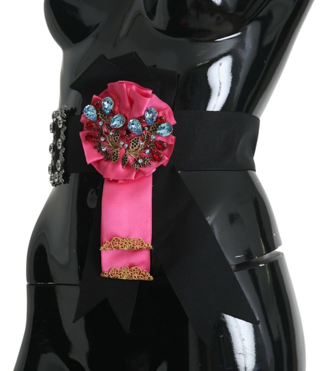 Authentic Dolce & Gabbana Crystal Waist Belt with Flower Brooches
  Brand new with tags and box
  Baroque belt for dress
  Crystal and brass flower brooches
  Ribbon included
  Made in Italy
  Quality craftsmanship
  Material: 80% Cotton 40% Acetate
Material: 80% Cotton 40% Acetate