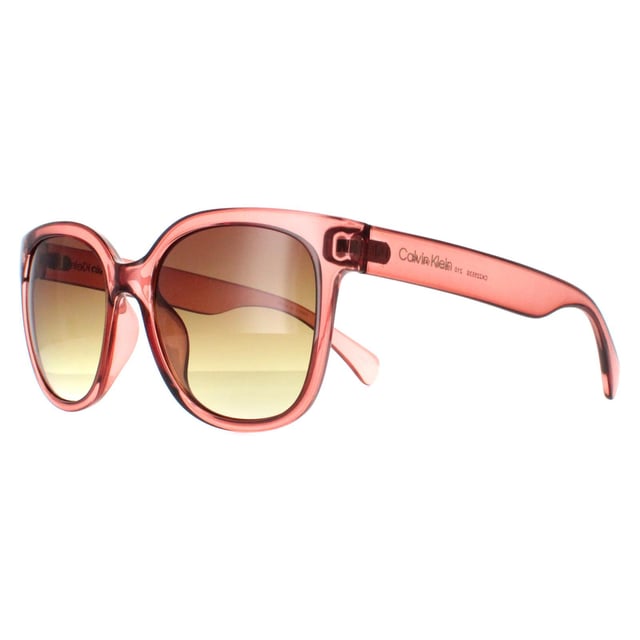 Calvin Klein Square Womens Transparent Brown Brown Gradient CK22553S  Sunglasses feature a chic square frame, crafted from high-quality acetate for a luxurious and comfortable feel. The design is accentuated by subtle detailing that adds a touch of glamour without overwhelming the minimalist aesthetic. The lenses provide complete UV protection, ensuring your eyes are shielded from harmful rays while offering excellent visual clarity.