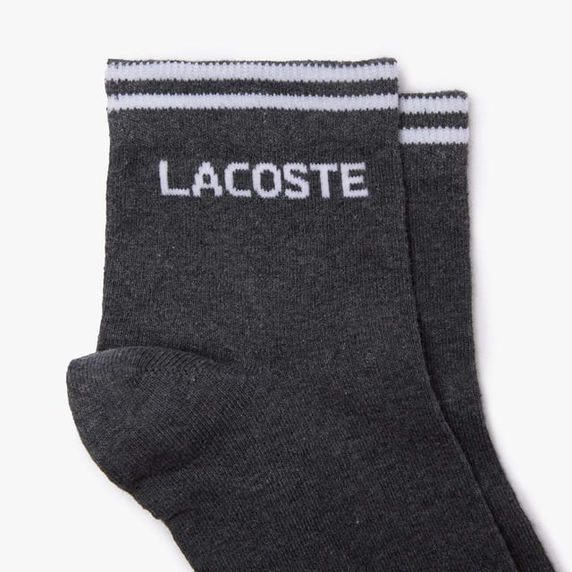 Unisex Lacoste SPORT Low Cotton Sock 2-Pack.- Stretch cotton blend jersey.- Oversized jacquard Lacoste branding on ankle.- Oversized jacquard crocodile on sole. Material: 100% Cotton. Ref: RA4187NKJ.