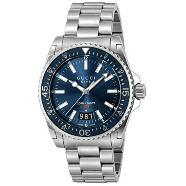 Product Specifications 

Brand: Gucci
Model: YA136311
Movement: Swiss made quartz (battery)
Case Size: 40mm
Case Material: Stainless steel

Band Material: Stainless steel
Dial Colour: Blue

Glass: Sapphire crystal
Water Resistance: 200m or 20ATM

Product Descriptions
Elevate your wristwear to new heights with the Gucci Dive Stainless Steel Bracelet Blue Dial Men's Watch â€“ a fusion of impeccable style and Swiss precision. Immerse yourself in the world of luxury with a timepiece that effortlessly marries functionality with fashion, reflecting the timeless allure of Gucci.
Powered by a Swiss-made quartz movement, this watch ensures unrivalled accuracy and reliability. The battery-driven mechanism seamlessly integrates with the renowned Swiss craftsmanship, providing a timepiece that not only keeps precise time but also reflects the commitment to excellence synonymous with Gucci.
The 40mm case, crafted from durable stainless steel, presents a sleek and modern design that exudes sophistication. The meticulous attention to detail in both form and function makes this watch a versatile companion for any occasion, embodying the essence of contemporary luxury.
The stainless steel bracelet not only complements the case seamlessly but also adds a touch of refinement to your wrist. The link bracelet design ensures a comfortable fit while enhancing the overall elegance of this Gucci timepiece.
The striking blue dial serves as a canvas for timekeeping precision and aesthetic brilliance. The simplicity of the design, coupled with the signature Gucci detailing, makes for a dial that is both bold and timeless, embodying the brand's distinctive style.
Protected by scratch-resistant sapphire crystal, the dial remains clear and pristine, offering enduring clarity and protection against daily wear. This premium crystal ensures that your watch maintains its impeccable appearance over time.
With a remarkable water resistance of 200 meters or 20ATM, the Gucci Dive watch is not just a style statement but a reliable companion for underwater adventures. From diving to water sports, this timepiece is designed to withstand the rigors of aquatic activities.