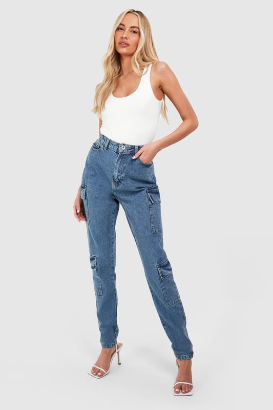Slim fit cargo jeans designed for taller frames
        Multiple utility pockets for added functionality
        High-rise waist for a flattering silhouette
        Tapered leg design for a modern look
        Versatile denim fabric suitable for various casual occasions
    
    Embrace the fusion of style and practicality with these Tall Basics Slim Cargo Jeans from Boohoo. Perfect for the fashion-forward woman who values both trend and comfort, these jeans offer a contemporary twist on a classic design. The slim fit accentuates your curves while the cargo pockets add an edgy, utilitarian flair. Style them with a crisp white tank top and strappy heels for a chic daytime look, or pair with a slouchy jumper and trainers for a more relaxed vibe. These jeans are ideal for casual outings, from coffee dates to weekend shopping trips. Their versatility makes them a wardrobe staple that can be dressed up or down to suit any casual occasion. The denim fabric ensures durability and ease of care, making these jeans a practical choice for the busy, style-conscious woman.