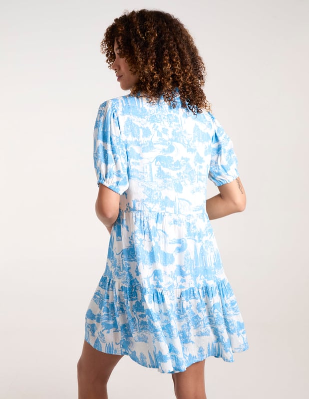 Soft and light mini smock shirt dress with a lovely summer print.