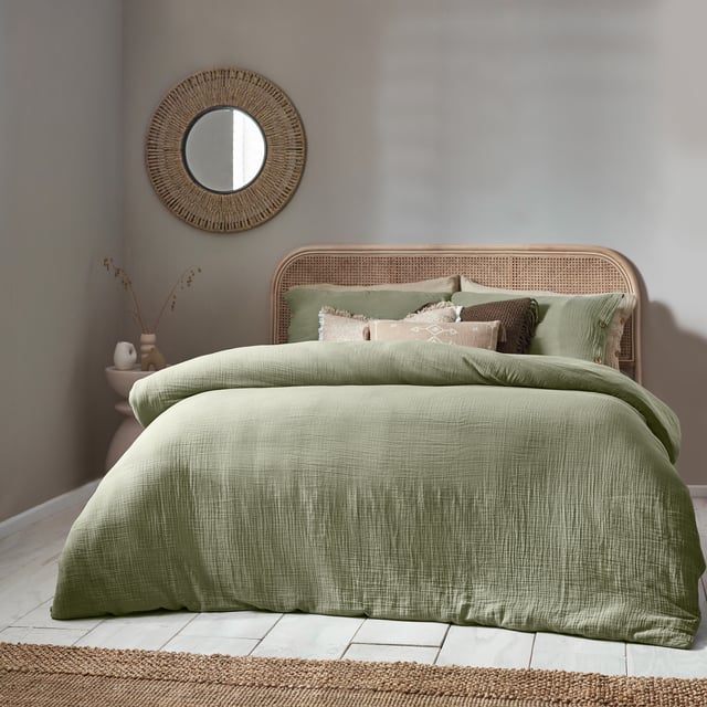 Inspired by timeless classic fabrics, the Lark duvet cover set is made from ultra-soft double-layer muslin cotton fabric. Available in a range of pastel tones, this bedding is complete with a wooden button closure. The cosy crinkle texture is perfect for bringing a relaxed, stylish feel to your bedroom. Cool and breathable in the summer months and snuggly and warm in the winter, muslin is used on both sides for an understated yet modern look. This product is certified by OEKO-TEX®, showing it has been sustainably made.