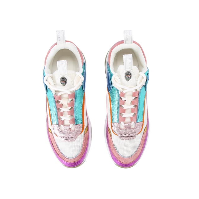 The Kensington Sneaker's upper features mesh, suede and textured leather panels. The tongue features a white branded monocle with antiqued silver head.