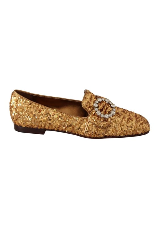 Marca: Dolce & Gabbana.
  Condicion: Nuevo con etiquetas.
  Estilo: Mocasines planos.
  Detalle: Gemas de lentejuelas y cristales.
  Puntera: Cuadrada.
  Plantilla: Piel con logo cosido.
  Material: Mordore y paillette.
  Color: Dorado.
  Adorno: Cristal transp.