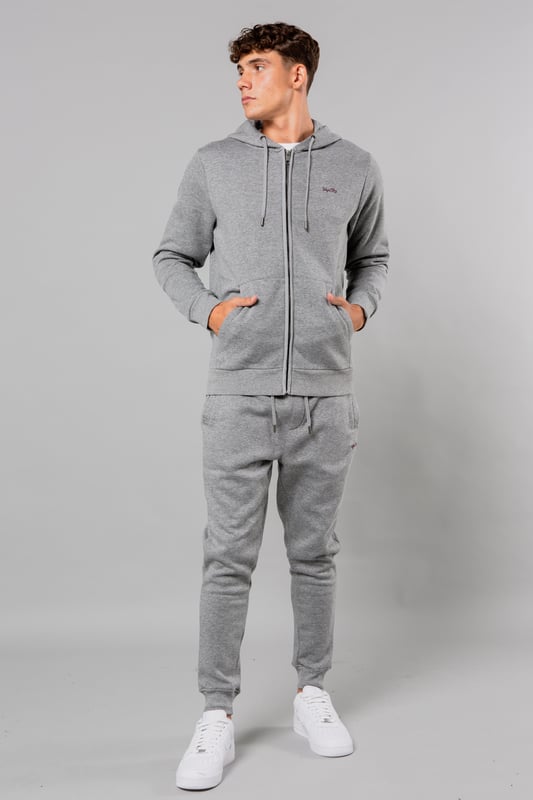 Stay cosy and comfortable in this zip-through hoody and jogger set from Tokyo Laundry. This set features a drawstring waist and a drawcord hood for a perfect, adjustable fit. The kangaroo pocket adds functionality to the stylish design. The fabric is a cotton mix and is machine washable for easy care. This set is a must-have for casual and loungewear.