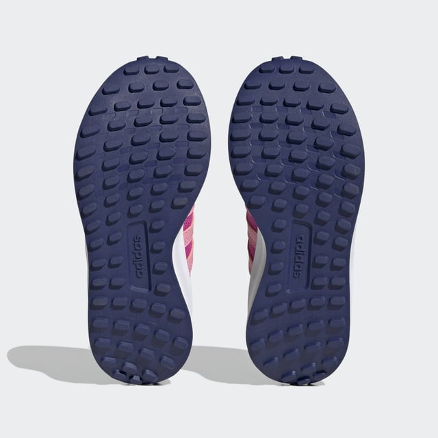 Bring your child a touch of the old school. These kids' adidas sneakers are inspired by '70s running shoes and have two hook-and-loop straps to ensure those feet stay in place. The Cloudfoam midsole is soft and cushiony to keep them comfortable throughout the day. Suede overlays on the toe and heel add a touch of nostalgia and texture to the look. Made with a series of recycled materials, and at least 50% recycled content, this product represents just one of adidas' solutions to help end plastic waste.  - Regular fit - Hook-and-loop closure - Closed mesh upper - Textile lining - Toe and heel protective overlays - Cloudfoam midsole - Rubber outsole - Upper contains a minimum of 50% recycled content  Shipped by adidas