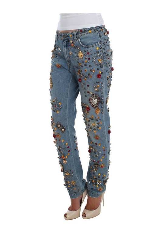 Gorgeous brand new Dolce & Gabbana blue wash crystal heart Roses embellished enchanted Sicily boyfriend fit jeans
  Made from a blend of 69% cotton 15% brass 5% crystal 5% zama 3% plastic 2% glass and 1% elastane
  Light blue wash with gold and silver metal detailing
  Zipper and button fly closure
  Multicolor crystal embellishments
  Two front pockets and back pockets
  Logo details
  Made in Italy
  Exclusive and rare one of a kind pair of jeans
Material: 69% Cotton 15% Brass 5% Crystal 5% Zama 3% Plastic 2% Glass 1% Elastane