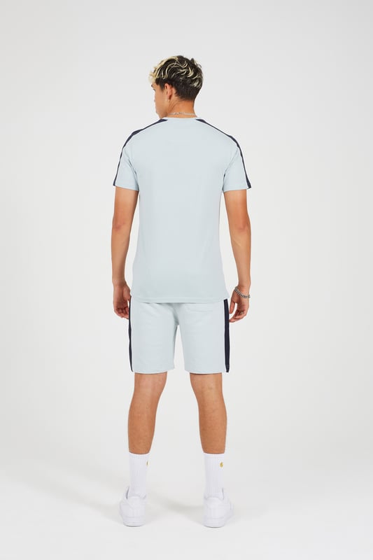 Upgrade your casual wardrobe with this t-shirt and short set from Brave Soul. The matching set includes a t-shirt with a chest print, shorts with contrast detailing, and an elasticated waistband. With two side pockets to provide ample storage for your everyday essentials. Model wears UK size M.