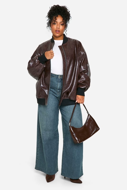 Plus Cracked Faux Leather Oversized Bomber Jacket boohoo PlusYou’ll find full on fashion for the fuller figure with the boohoo Plus range. Delivering directional designs for UK sizes 16 to 24, this ultra-flattering collection combines perfectly proportioned fits with statement styles so that you can stay on top of this season’s trends.