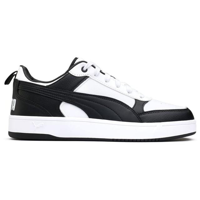 Lace Up And Power Your Stride With The Puma Dribble Court Trainers. These Retro-inspired Kicks Feature A Synthetic Leather Upper With The Iconic Puma Branding. The Padded Collar And Comfort Insole Cushion Your Every Step, While The Grippy Rubber Outsole Handles The Blacktop Like A Pro. Whether Playing A Pick-up Game Or Just Looking The Part, These Classic Black And White Trainers Have You Dribbling In Style.