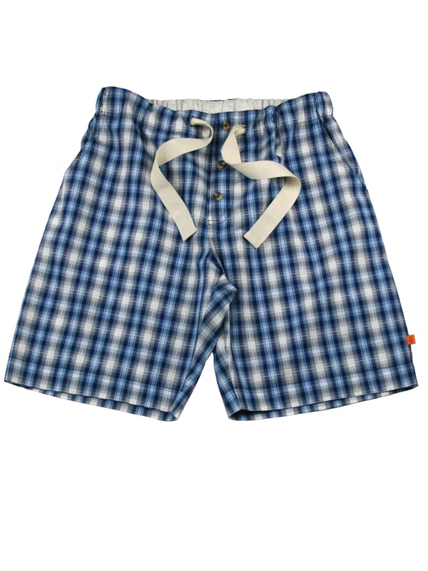 'Windsor' summer unisex longer length lounge shorts in a Navy, Blue and white woven check fabric.
100% Cotton
Machine Washable
Cool luxury woven Cotton fabric
Comfortable jersey inner waistband
Unisex
Drawcord waist
These Blue check PJ and loungewear shorts are for all to wear at any time of day! Great for holidays too! Traditional but also on trend!  Girls - they look fantastic rolled up to make them shortie shorts :)
Check our size guide for your size