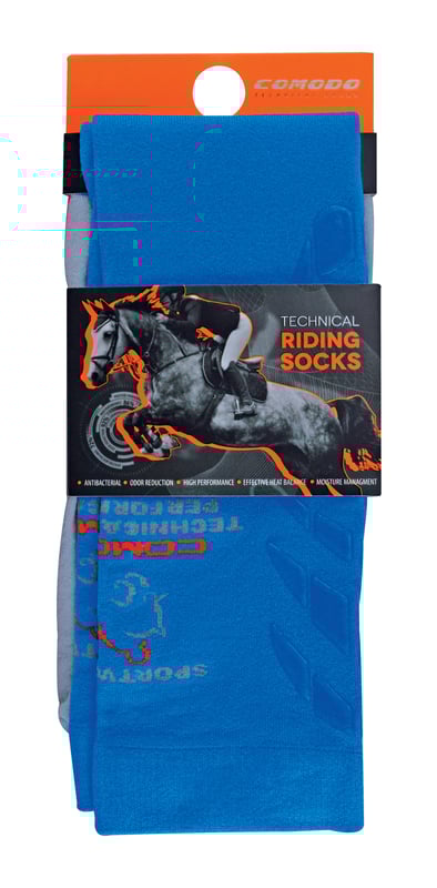 Comodo Microfibre Horse Riding Socks  Comodo have been providing high-quality socks for men and women since 1996. They sell a range of socks for hiking, cycling, hunting, skiing, and now, horse riding! Whichever type of socks you wear, your feet are bound to feel comfortable and warm, no matter the weather or environment!  It's important to wear soft and comfortable socks when horse riding. That's why Comodo have crafted microfibre horse riding socks foe men and women.  These socks are lightweight and functional as they fit effortlessly under riding boots for a cool, comfortable ride.  They have been constructed in fine microfibre to provide maximum protection against abrasion, and the breathable knit keeps legs cool in the summer and warm in the winter.  The soft touch cotton material also helps to wick away moisture and sweat especially, if you've been horse riding for longer hours in the summer.  With their support and reinforcements in all the right places, Comodo riding socks are sure to look great and maintain their condition wear after wear.  Choose from these colourful block panels for your favourite pair of horse riding socks. These socks are made from 45% Polyamide Microfibre, 25% Cotton, 25% Polyamide, 5% Elastane. They are available in sizes 3-5.5 UK, 6-8 UK, 35-38 EU, 39-42 EU. These socks are hand washable at 30 degrees.  Extra Product Details  - Microfibre Horse Riding Socks  - Lightweight Feel  - Microfibre Leg  - Knee-High Length  -Cotton Foot  - Reinforce Sole  - Men and Womens  - Hand Washable at 30  - 45% Polyamide Microfibre, 25% Cotton, 25% Polyamide, 5% Elastane