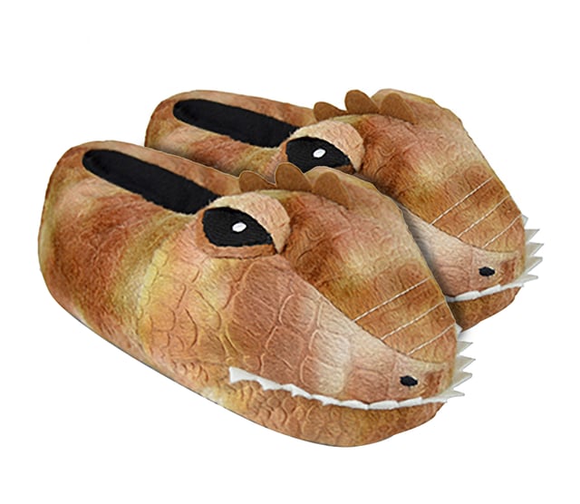 These soft, plush, 3D dinosaur themed slippers will warm up any child's feet. Their soft fleece fur with cushioned insole will keep your child's feet cosy and snug while they look awesome in their 3D dinosaur feet! They also feature non slip PVC dots to avoid slipping and sliding on tiled or wooden floors. Available in four different sizes: S (9-10), M (11-12), L (13-1 ), XL (2-3).