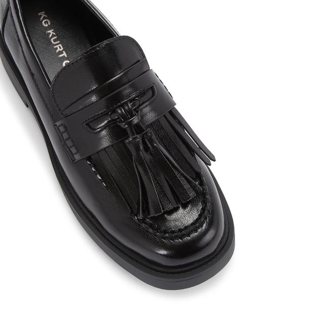 The KG Kurt Geiger Mack is a loafer featuring a black upper. There is a statement tassel detail on the toe.