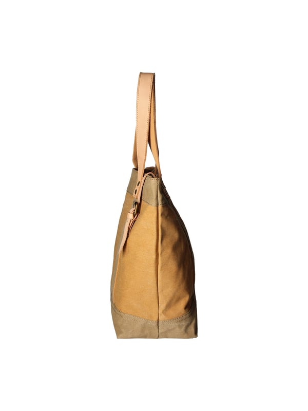 Bolso de mano de mujer de un compartimento en lona y piel genuina. Producto artesanal