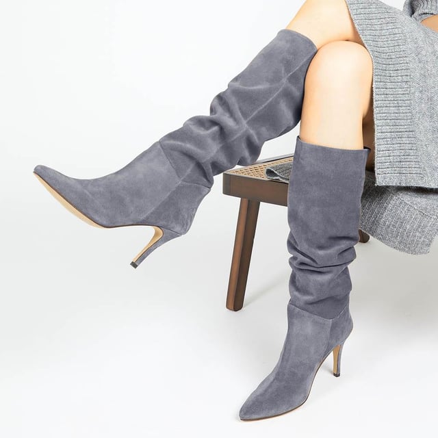 Our Luz knee high boots see sharp craftsmanship and style combined with ultra-soft suede and a slouchy silhouette. Poised upon a delicate stiletto heel and imagined with a pointed toe for added definition. Constructed with soft leather and textile internals for luxury comfort in an effortless pull on fitting. A modern classic that will never go out of style, wear Luz with tucked-in jeans or be bold and opt for a daring mini skirt.


Calf Measurements:
Size 3: 360mm, Size 4: 370mm, Size 5: 380mm, Size 6: 390mm, Size 7: 400mm, Size 8: 410mm