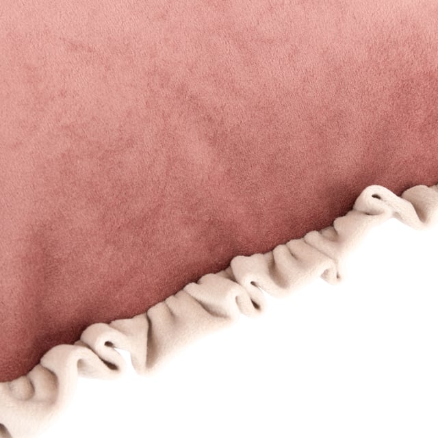 The Tilly cushion is made entirely of soft, opulent velvet and comes in a variety of soft pastel colours to help create a sophisticated look for your sofa. The dual-sided cottage core frill trim adds gravitas to the design, making it easy to combine with other larger cushions as part of a larger design scheme.