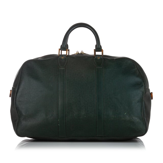 VINTAGE. RRP AS NEW. The Kendall GM features a taiga leather body, rolled leather handles, and a top zip closure.Exterior back is discolored, out of shape and scratched. Exterior bottom is discolored and scratched. Exterior corners is discolored and peeling. Exterior front is discolored, out of shape and scratched. Exterior side is out of shape. Screw is scratched and tarnished. Zipper is scratched and tarnished.

Dimensions:
Length 32cm
Width 45cm
Depth 22cm
Hand Drop 12cm
Shoulder Drop 80cm

Original Accessories: Shoulder Strap

Serial Number: SP0995
Color: Green x Dark Green
Material: Leather x Taiga Leather
Country of Origin: France
Boutique Reference: SSU103539K1342


Product Rating: FairCondition
