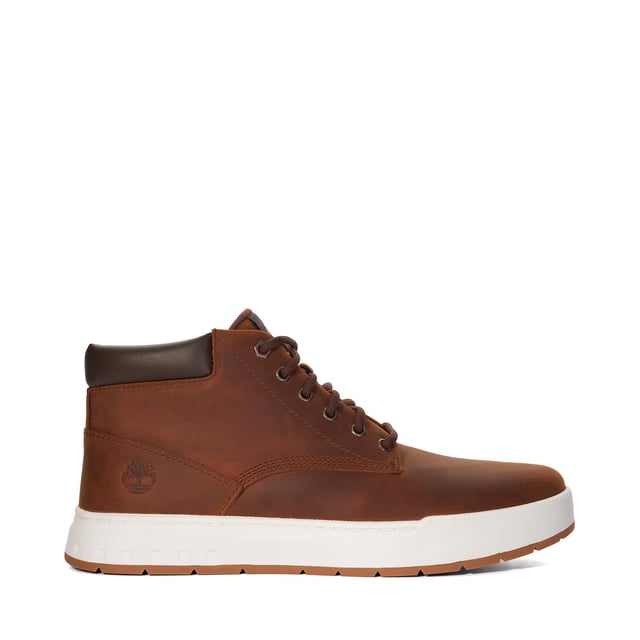 Sporty yet refined, the Maple Grove chukka from Timberland is crafted to feel comfy on the inside and look stylish on the outside. The chukka features a high-traction rubber outsole, and a ReBOTL lining containing at least 50% recycled plastic.