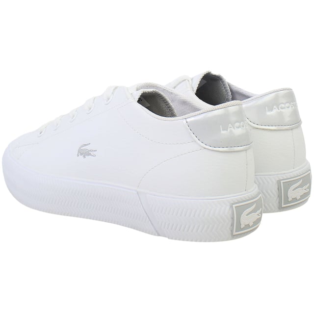 The Lacoste Gripshot 223 1 JD Kids White Trainers offer a stylish and durable option for active kids. Combining classic Lacoste design with a playful twist, these trainers are perfect for school, playtime, or casual outings.
Â 
Key Features:
Durable Canvas Upper: 

Lightweight and breathable, providing comfort and durability for daily wear.


Iconic Lacoste Branding: 

Features the signature crocodile logo on the side and subtle detailing for a stylish, sporty touch.


Cushioned Insole: 

Ensures all-day comfort and support for growing feet, ideal for active lifestyles.


Padded Collar and Tongue: 

Enhances comfort and provides a secure, snug fit around the ankle.


Rubber Outsole: 

Offers excellent grip and durability, making these trainers suitable for various surfaces.


Classic Lace-Up Design: 

Allows for an adjustable and secure fit to accommodate growing feet.


Timeless White Colorway: 

A versatile and clean design that pairs effortlessly with school uniforms, sportswear, or casual outfits.


Â 
The Lacoste Gripshot 223 1 JD Kids White Trainers are a practical and stylish choice for kids who need dependable footwear for both play and everyday activities, all while maintaining a classic look.
Â 
Â 
Â 