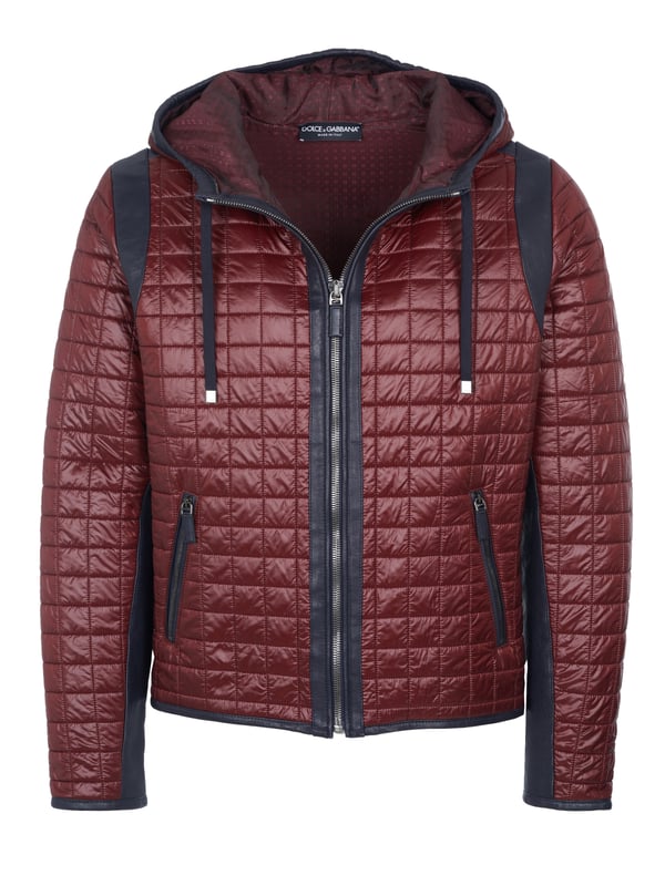 95% Polyamid, 5% Schafleder; Dolce & Gabbana Jacke;  Modell: G9EA5T G7AUZ 79;  Hochwertig verarbeitet;  Kapuze mit Tunnelzug;  Verschluss: Reißverschluss;  Zwei Fronttaschen mit Reißverschlüssen;  Zwei Innentaschen mit Reißverschlüssen