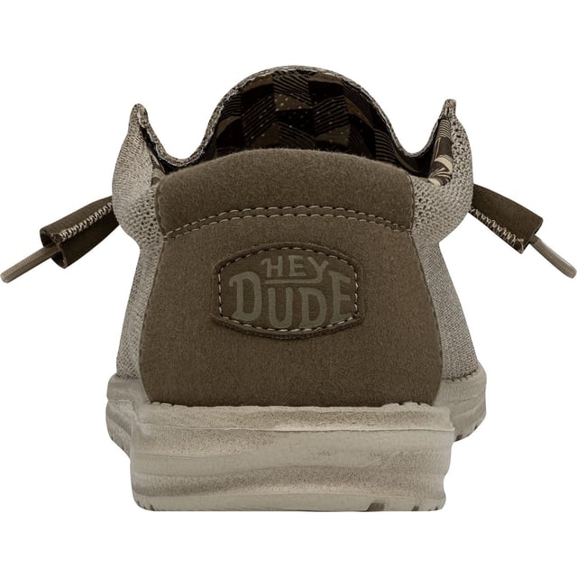 The Wally Sox is made with a polyester woven upper that has a knit texture. Elastic laces make the shoes easy to slip on and off. The foam insole adds an extra layer of cushion to the tried-and-true EVA foam outsole.