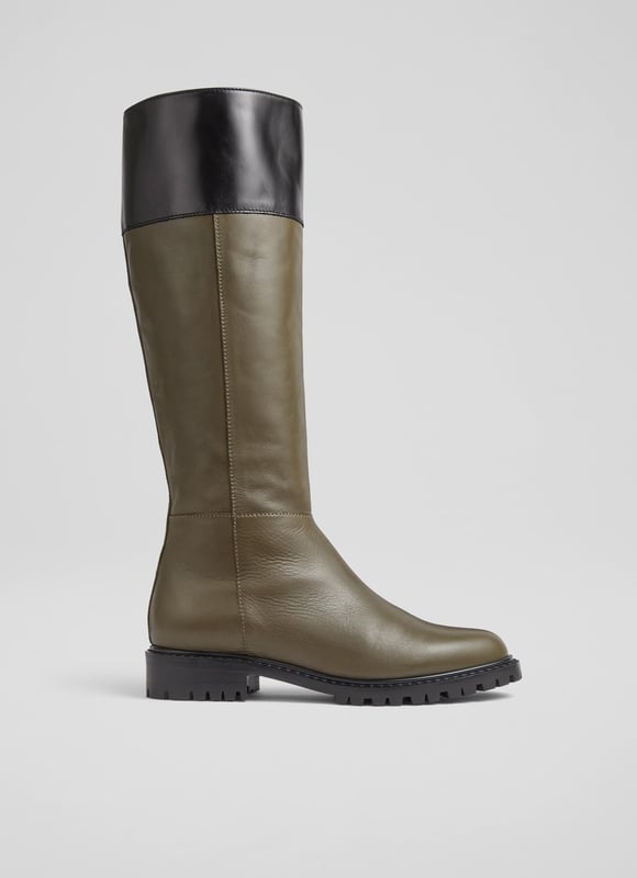 LK Bennett Lincoln Knee Boots, Army Green A knee-high boot with a biker feel, our Lincoln flat boots are a brand-new style in our autumn/winter collection. Crafted in Italy from super-soft army green calf leather, they have a round toe, a contrast border in black, an inside zip and a rugged, chunky flat sole. Wear them to dress down winter dresses or with jeans on more casual days.