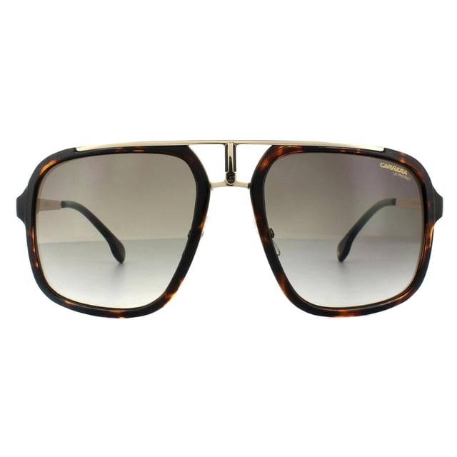 Las gafas de sol Carrera 1004/s 2ik ha Havana Gold Brown Gradient son un estilo clásico de Carrera con la forma de mosca retro cuadrada y detalles tallados en el puente. Las finas patillas metálicas hacen juego con los detalles del puente para una combinación ganadora de metal y plástico.