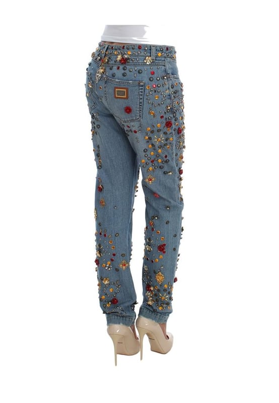Gorgeous brand new Dolce & Gabbana blue wash crystal heart Roses embellished enchanted Sicily boyfriend fit jeans
  Made from a blend of 69% cotton 15% brass 5% crystal 5% zama 3% plastic 2% glass and 1% elastane
  Light blue wash with gold and silver metal detailing
  Zipper and button fly closure
  Multicolor crystal embellishments
  Two front pockets and back pockets
  Logo details
  Made in Italy
  Exclusive and rare one of a kind pair of jeans
Material: 69% Cotton 15% Brass 5% Crystal 5% Zama 3% Plastic 2% Glass 1% Elastane