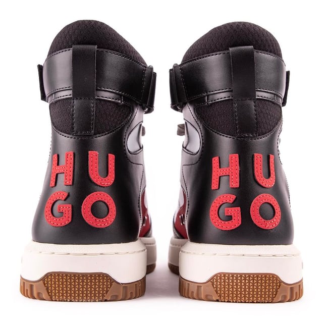Hugo Kilian Hito Entrenadores El equilibrio definitivo entre deporte y estilo. Aquí tienes un par de zapatillas deportivas para hombre en blanco y negro de HUGO. con detalles en rojo. un contemporaneo. Aspecto fresco de diseñador y vibraciones retro del béisbol. Esta cómodo. Zapato de moda urbana con la marca distintiva y las cualidades de Kilian Hito.