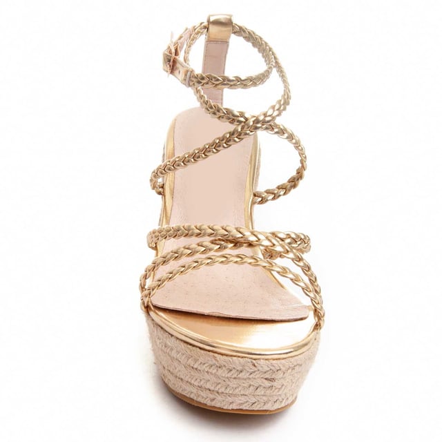 Women's esparto wedge sandal. Cushioned natural leather insole. Comfortable fit. Non-slip sole. Reinforced stitching. Manufactured by other brands for our brand. Approximate measurements: 12 cm wedge and 3 cm platform.