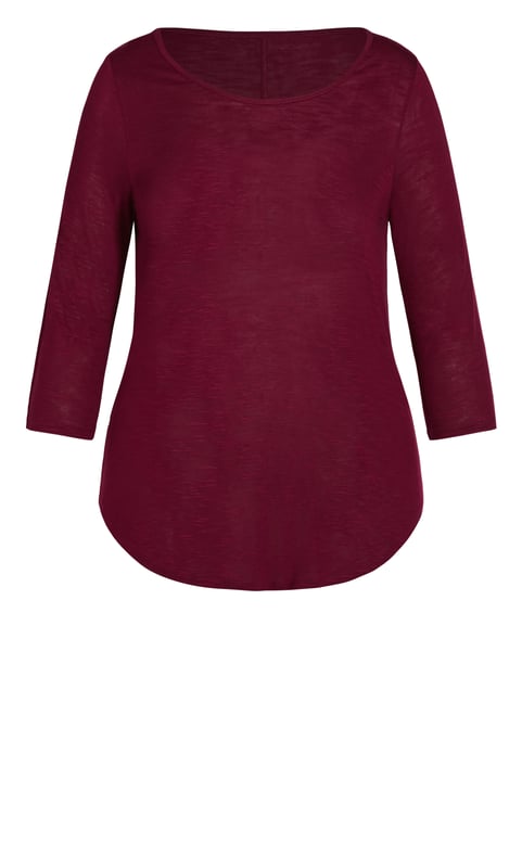 Opt for an elegant berry hue with our 3/4 Sleeve Slash Neck Top, offering a scoop neckline, 3/4 sleeves and soft stretch fabrication. Whether dressing down for a day at the shops or elevating your outfit for a dinner outing, this simple style can do it all! Key Features Include: - Scoop neckline - 3/4 sleeves - Relaxed fit - Soft stretch fabrication - Pull over style - Unlined - Hip length - Curved hemline Upstyle your evening look with leather look trousers, strappy stilettos and a chunky chain necklace.
