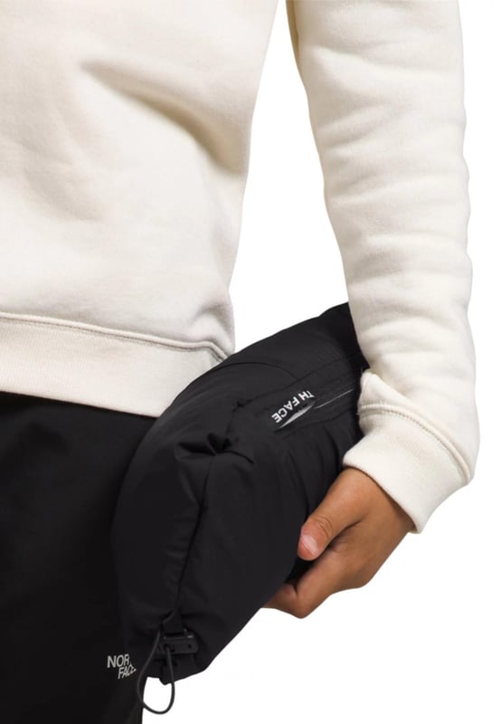 The North Face Nuptse has been delivering game-changing warmth since 1992 and no other jacket has journeyed so naturally from the mountains to city streets. - - .   The Teens' 1996 Retro Nuptse Gilet is a modern reincarnation of the icon, built for young adults. - - .  We’ve kept most things the same: the same boxy silhouette; the same shiny ripstop fabric; the same exposed zip and diagonal hand pockets and, of course, the same oversized baffles. - - .  The only change is upgrading to 700-fill of responsibly sourced down. - - .  It's also made with recycled materials, making it kinder to nature. - - . Shell: 100% Nylon, Lining: 100% Polyester, Filling: 90% Down, 10% Waterfowl Feathers.