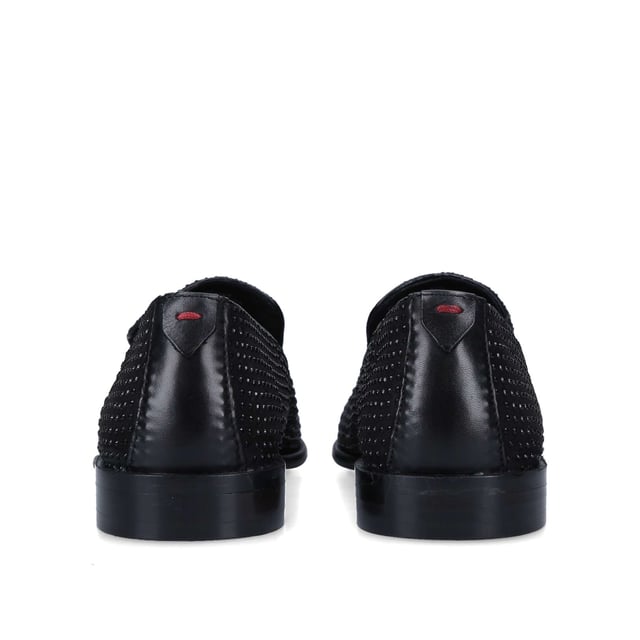 Crafted in a black suedette material, the Sting loafers are a formal style embellished with small black studs across the upper. The ankle features a very small red stitch sitting comfortably on a black block heel.