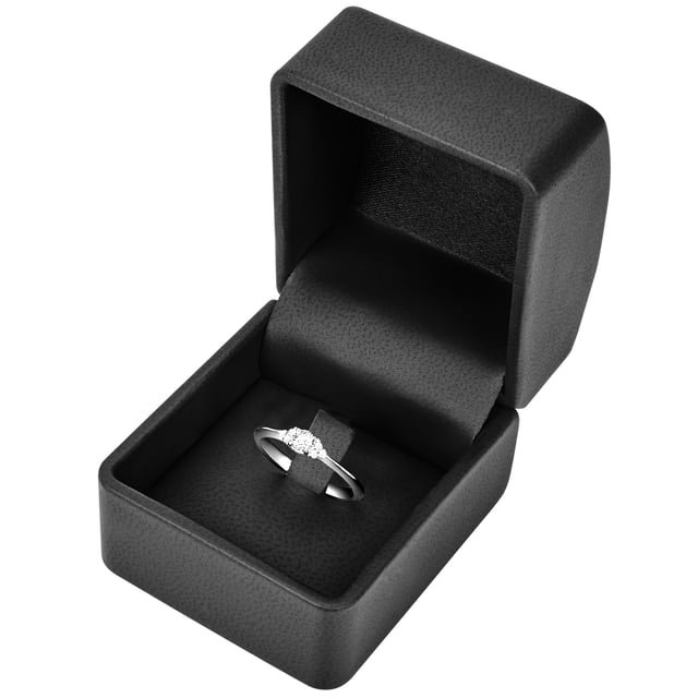 There are moments that we remember for a lifetime. With this noble engagement ring from the jewelry manufacturer Tresor 1934, you will certainly put a smile on your face when you request your dream woman. The solitary ring made of 925 sterling silver sparkles almost magically like a star in the sky. Even in the smallest incidence of light, the light breaks out in the high -quality, cut zirconia stones. The classic design conquers every women's heart in the storm, so the only answer remains an excited thing: "Yes, I want!" With this ring you prove taste and stylish, because it can be combined universally with every modern outfit. A loving idea for Valentine's Day or birthday for her heart.