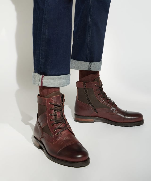 Dune Mens Cornered - Casual Leather Lace-Up Boots Meticulously crafted with smooth premium leather, our casual Cornered boots will infuse a touch of luxury into your everyday wardrobe. Set on a sturdy flat sole, the lace-up front is accentuated with metal eyelets for a refined finish. Cut for a neat round toe, the textural base has been overlayed with intricately cut-out details that effortlessly update the style.