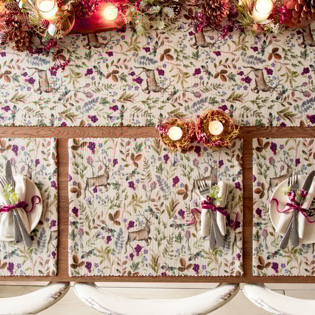 A wonderfully festive set of four placemats which features charming Reindeers who stand proudly amongst the vivid seasonal florals. Digitally printed for exceptional clarity on a durable woven polyester fabric, these beautifully designed table placemats will instantly transform your Christmas dining table.