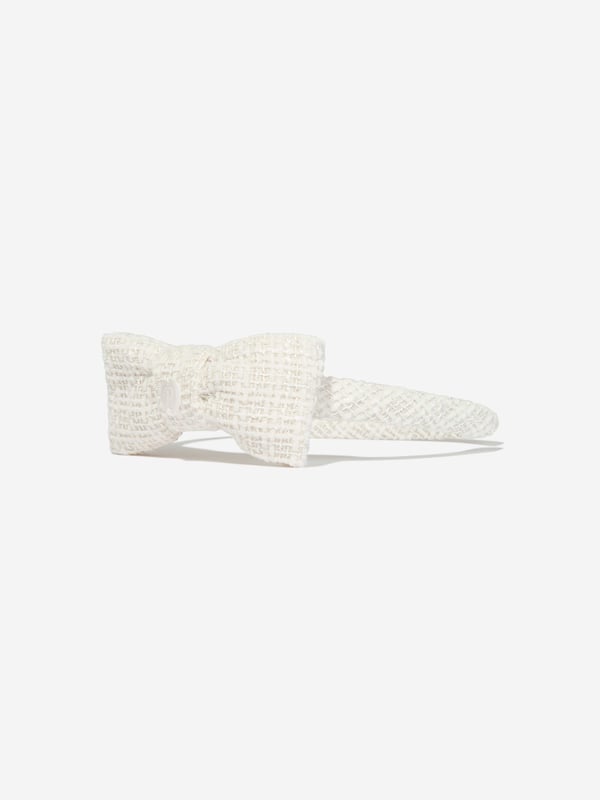 Introducing the Patachou Girls Special Occasion Bow Headband in pristine white, an essential addition for the sophisticated young lady's wardrobe for AW2024. Elegantly crafted for memorable events:‚ Exquisite White Bow: Features a large, elegant bow that adds a touch of class and timeless charm.‚ Premium Fabric: Constructed from superior quality fabrics, ensuring comfort and durability for all-day wear.‚ Versatile Elegance: Perfectly complements formal outfits, enhancing your girl's ensemble with its subtle grace.Elevate her special occasion attire with this Patachou headband. Shop now and let her shine in style!