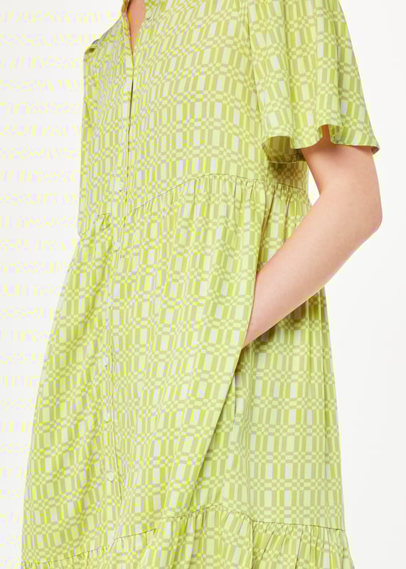 Elevate your style with our Link Trapeze Dress, perfect for any casual setting with its comfortable fit and vibrant pattern.