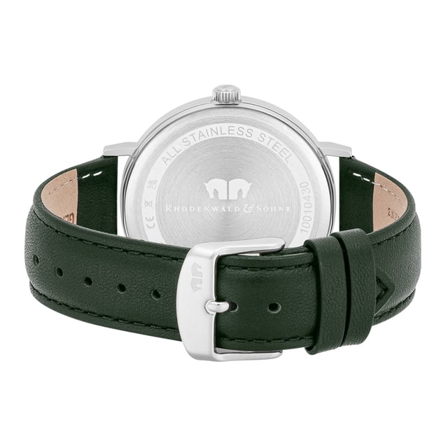 Stylish minimalism inspires from the principles of traditional Horlogerie: This timepiece of the Rhodenwald & Söhne manufacture is an accessory that also scores in demanding men and is often worn in the office and in leisure time. The puristic dial is limited to filigree Roman digits and line indices, a subtle minute and date display. The noble shimmering stainless steel case forms a narrow frame for the dial and nestles elegantly on every wrist. The real leather strap with color -coordinated seam ensures high comfort.