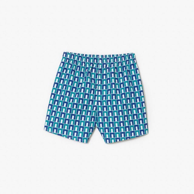 Monogram Print Swim Trunks Recycled polyester made from manufacturing offcuts Elasticated waist Embroidered crocodile on leg   Monogram Print Swim Trunks Recycled polyester made from manufacturing offcuts Elasticated waist Embroidered crocodile on leg