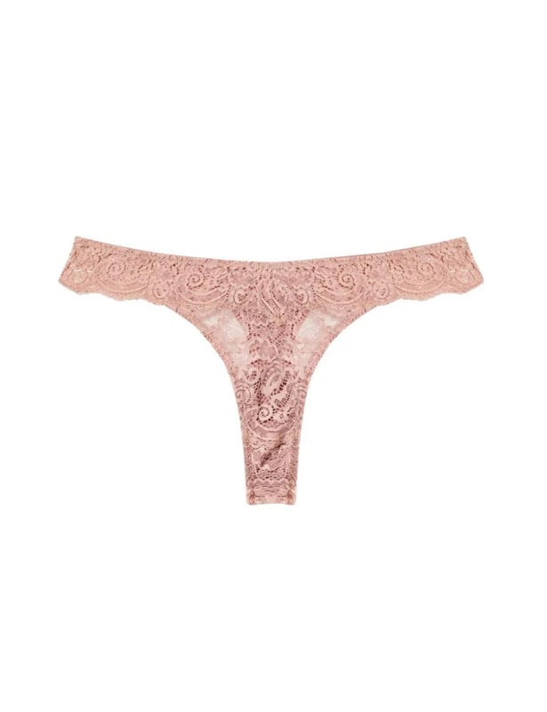 The Ariana range by Playful Promises brings this flirty thong that is perfect for adding a cute feeling to your daily life. Covered in semi-sheer lace it lays softly against your body. It has an extremely flattering shape with a high-cut leg that creates the illusion of longer legs whilst the mid-rise waist and minimal rear coverage showcase your incredible figure.  Flirty thong, Semi-sheer feminine lace, High-cut leg, Mid-rise waist and minimal rear coverage, Elasticated waistband, Comfortable fit, Country of origin: China, Composition: Main: 89% Polyamide | 11% Elastane, Composition: Gusset Liner: 100% Cotton, Listed in UK sizes.   Thong