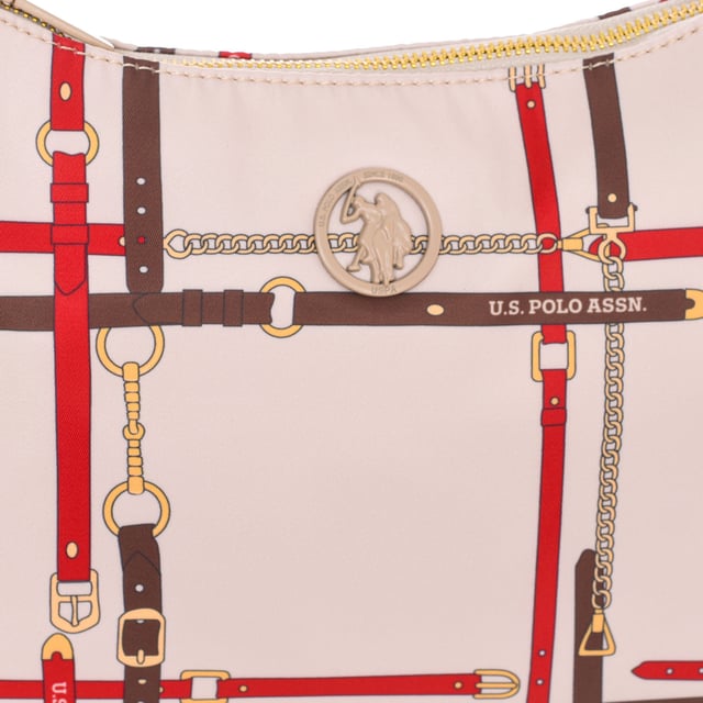 Baguette bag U.S. POLO ASSN.
 Synthetic.
 Zipper closure.
 Front interior: Two open pockets.
 Back interior: One zipper pocket.
 Includes two removable and adjustable straps.
 Interior lining with brand print.
 Brand logo on the front.
 Seams seen in tone.
 Measures: 29x22x8cm
 Composition: 70% Polyester, 30% Polyurethane
 Care:
Clean with a wet cloth.