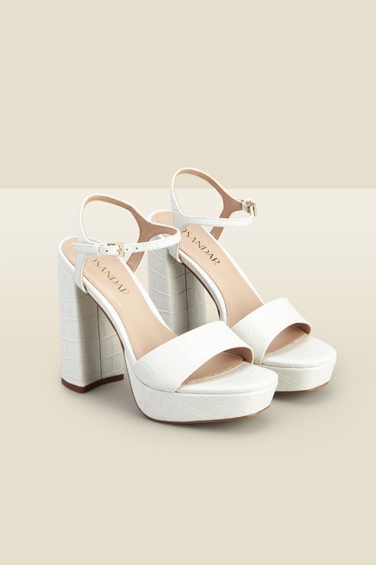 REASONS TO BUY:

Take your look to the next level
Platforms are trending
Luxe croc leather
You won't believe how comfy they are
Style with a silky blouse and flared jeans
Pair with a dress for weddings and parties.