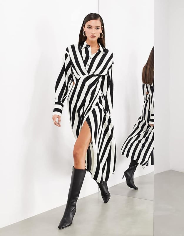 Dresses by ASOS EDITION POV: you have plans Spread collar Partial button placket Cut-out side Wrap skirt Buttoned cuffs Regular fitSold By: Asos