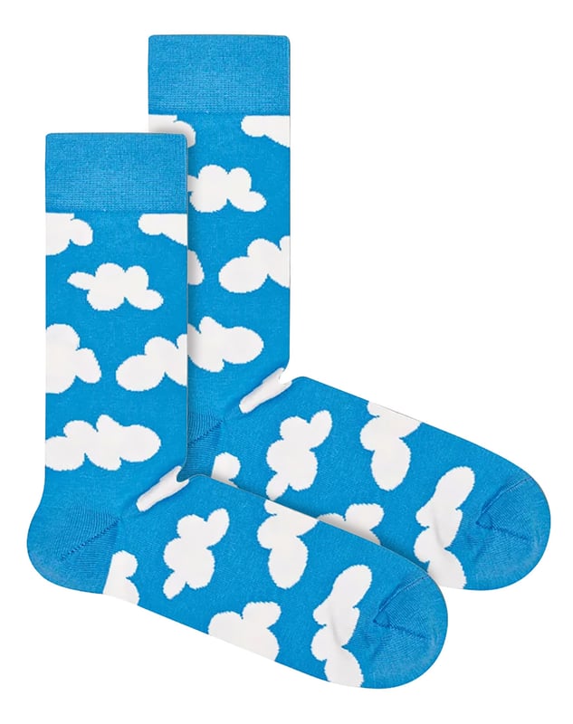 Happy Socks - Men’s & Ladies Novelty Cloud SocksDo some cloud watching without going out. The sky's the limit. These Novelty Socks with Cloud patterns by Happy Socks are a great pair for anyone who wants to jazz up their feet!These novelty socks have a soft cloud pattern that will keep you looking cool and feeling comfy all day long. Made with 86% combed cotton guaranteeing maximum comfort and softness. These Cloud socks would make a perfect last minute gift for anyone.They're also reinforced at the heel and toe for extra durability, so they'll last even longer than you would expect from such a fun pair of socks. The blue and white cloud pattern is sure to brighten up any day!Happy Socks are a popular brand providing a high-quality sock that combines unique designs and craftsmanship. Mikael Söderlindh and Viktor Tell had a vision to spread happiness by turning an everyday essential into a colourful design piece.Today, Happy Socks has reached 90 countries and every continent. With Concept Stores all around the world, from LA to Tokyo, Happy Socks can be found in over 10,000 top fashion apparel boutiques.These socks are made from 86% Cotton, 12% Polyamide, 2% Elastane and come in 2 sizes: Men’s 6-11 UK & Ladies 4-7 UK. They come in Blue & White and they are Machine Washable.Extra Product DetailsHappy Socks Adult Novelty SocksSoft Combed Cotton1 Pair Per PackReinforced Heel & ToeBlue & White Cloud PatternsA Perfect Gift IdeaSoft & ComfortableHappy Socks Branded2 Size OptionsMachine Washable